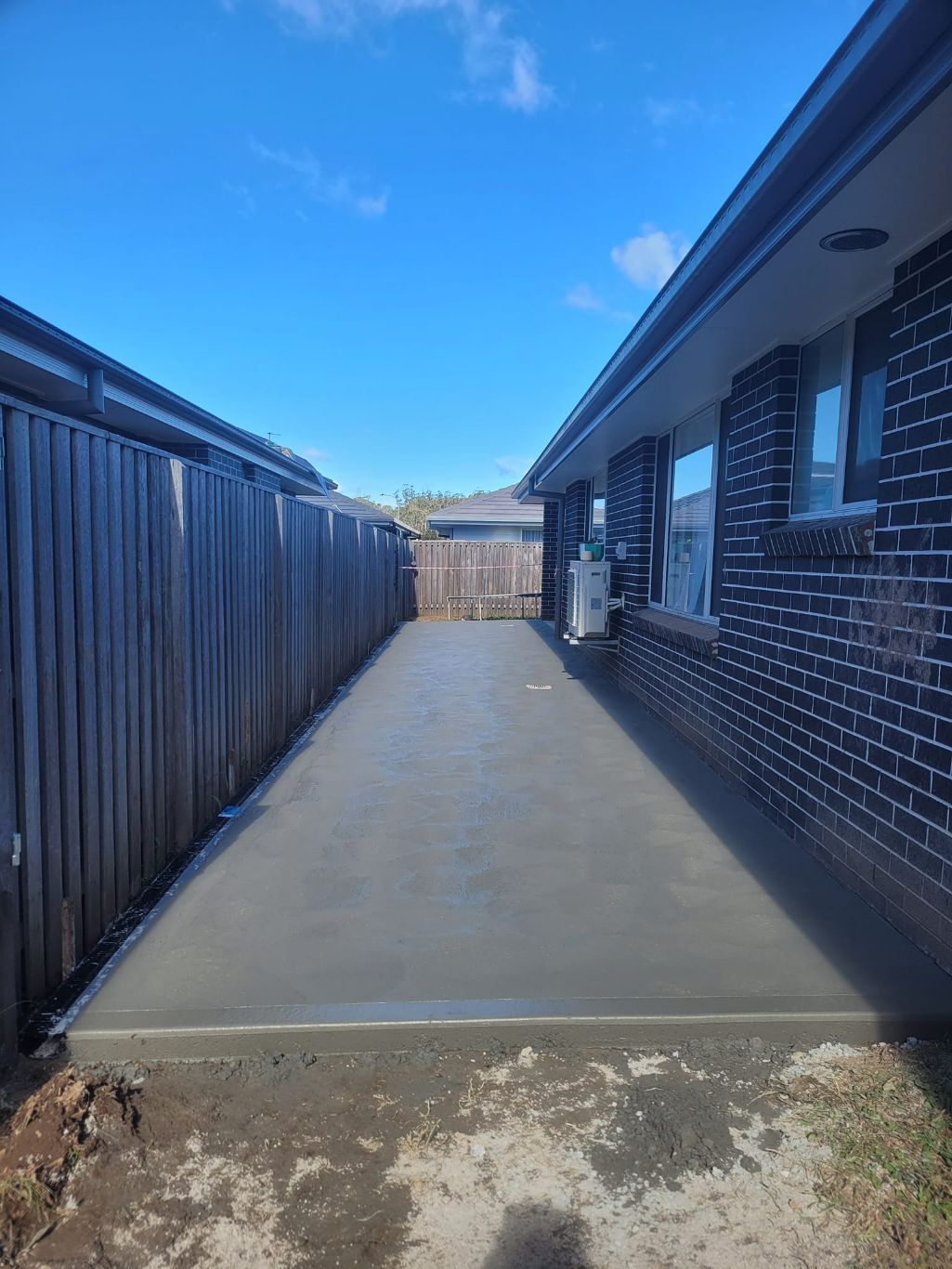Concrete Pathways at the Back of the House — Kempsey Concrete Contractors In Kempsey, NSW