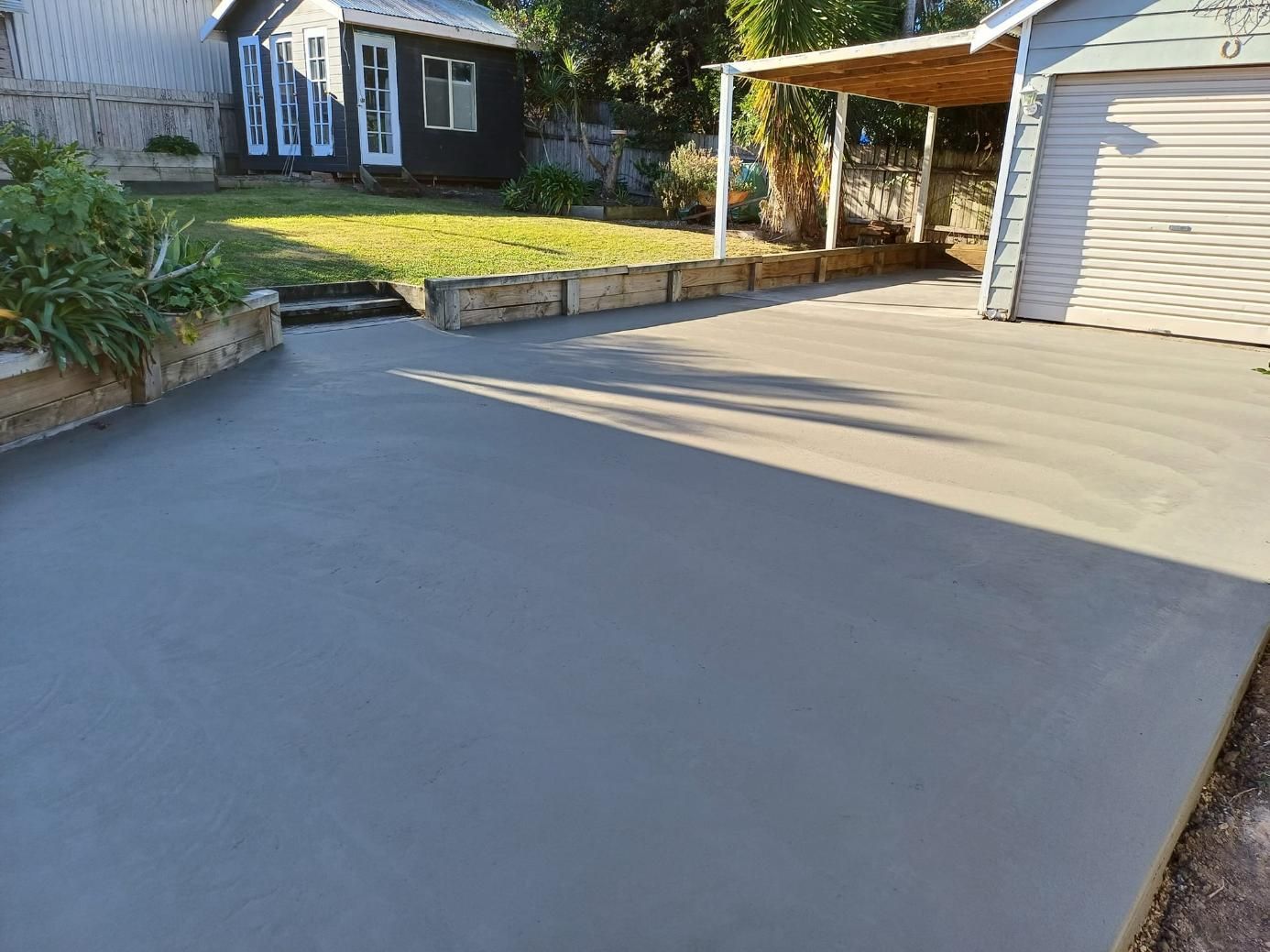 Newly Poured Concrete Driveway in a Residential Yard — Kempsey Concrete Contractors In Nambucca Heads, NSW