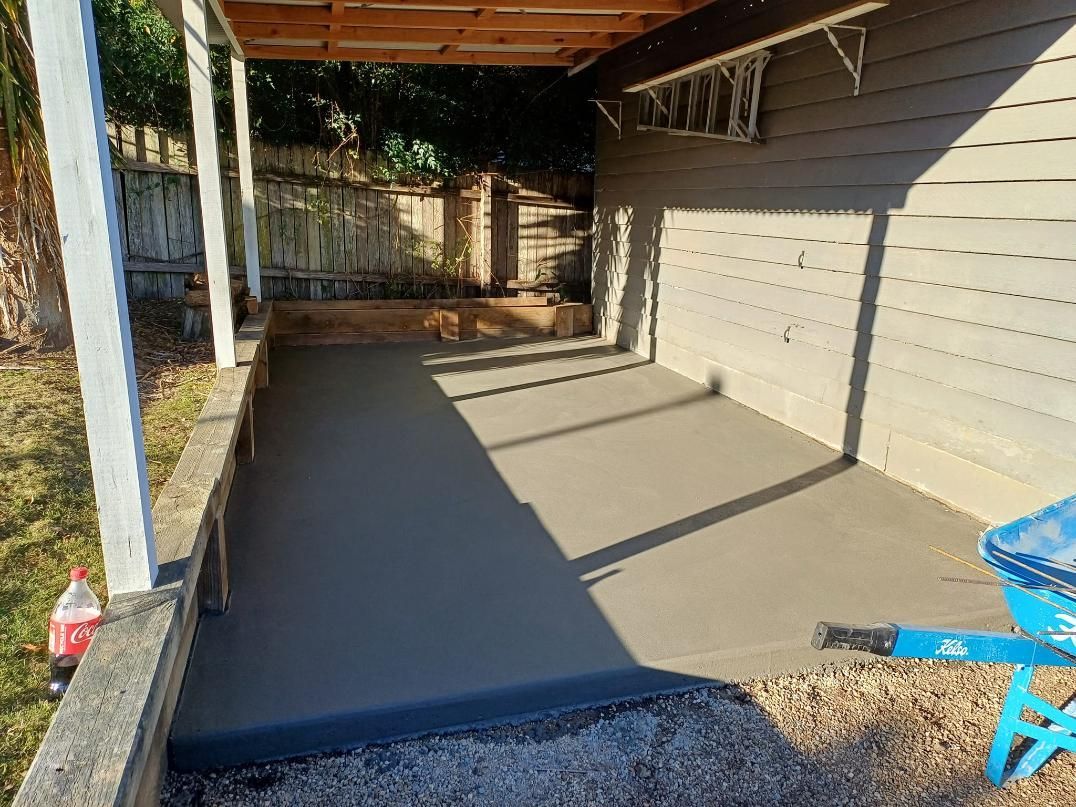 A Concrete Patio With a Covered Roof and Weathered Siding — Kempsey Concrete Contractors In Macksville, NSW