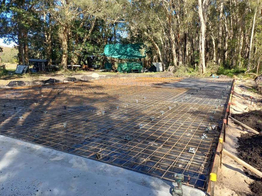 A Concrete Slab Foundation With Reinforcing Rebar Grid — Kempsey Concrete Contractors In South West Rocks, NSW