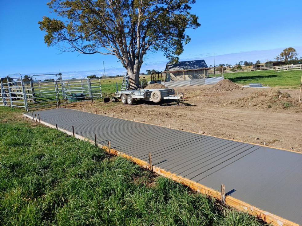 Freshly Poured Concrete Driveway With Wooden Forms — Kempsey Concrete Contractors In Nambucca Heads, NSW