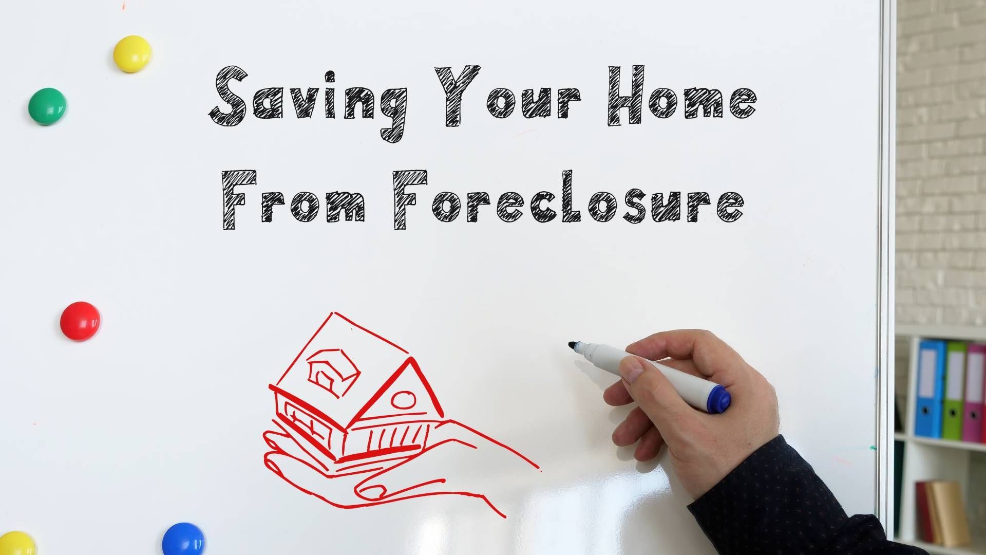 A person is writing on a whiteboard that says saving your home from foreclosure