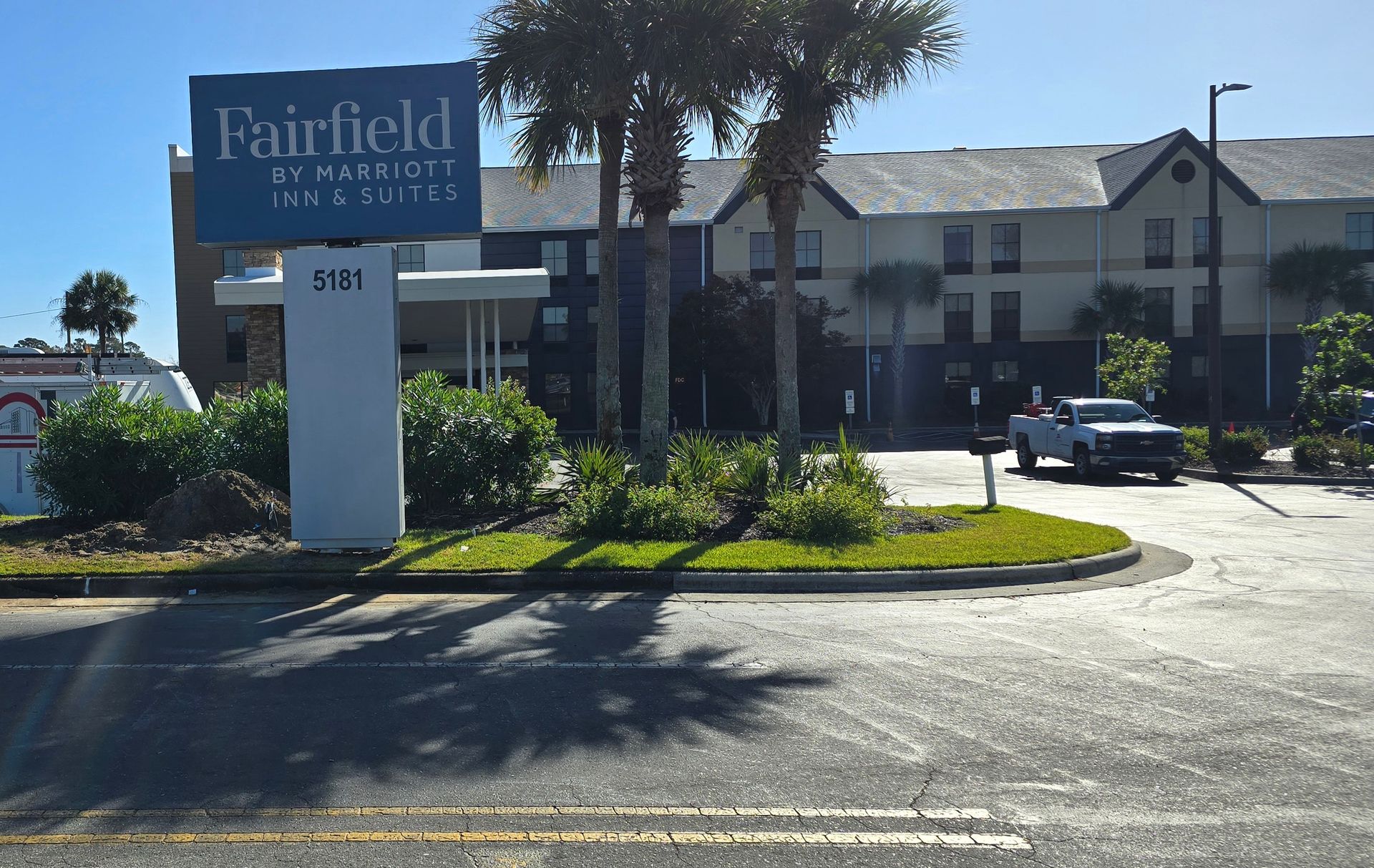 A sign for fairfield by marriott inn and suites