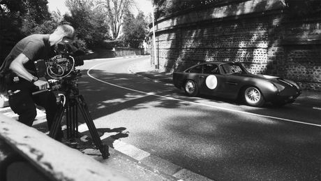 crew filming vintage car