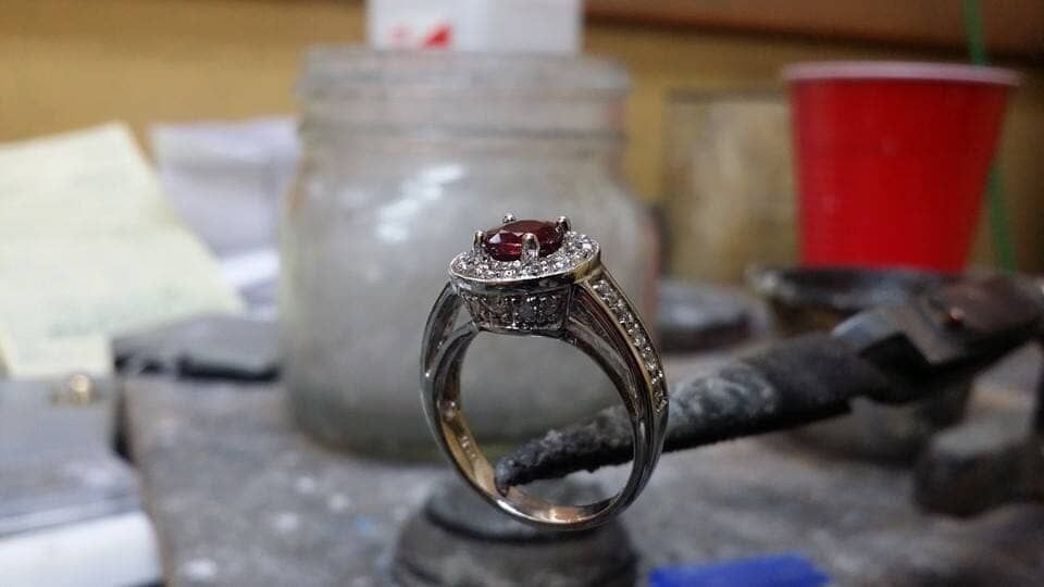A close up of a ring sitting on top of a table