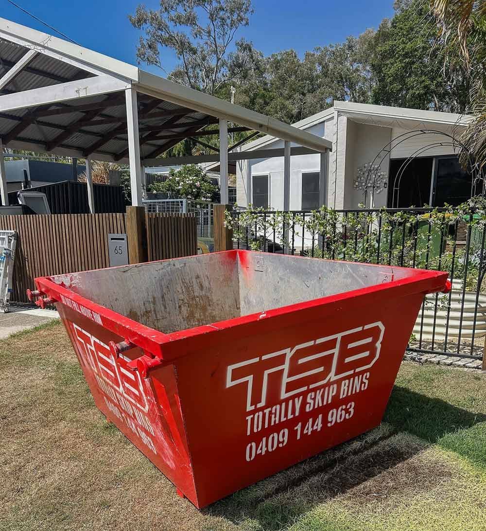 A Red Residential Skip Bin