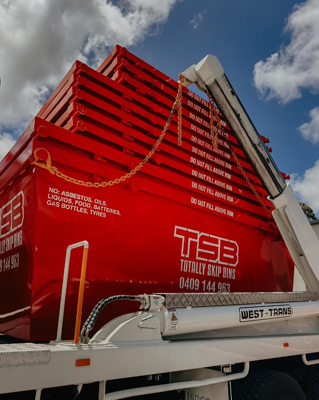 Stack of Red Skip Bins