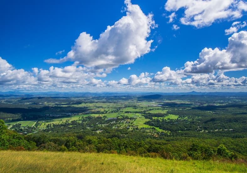 A View of a Lush Green Valley From the Top of a Hill — Totally Skip Bins in Canungra, QLD