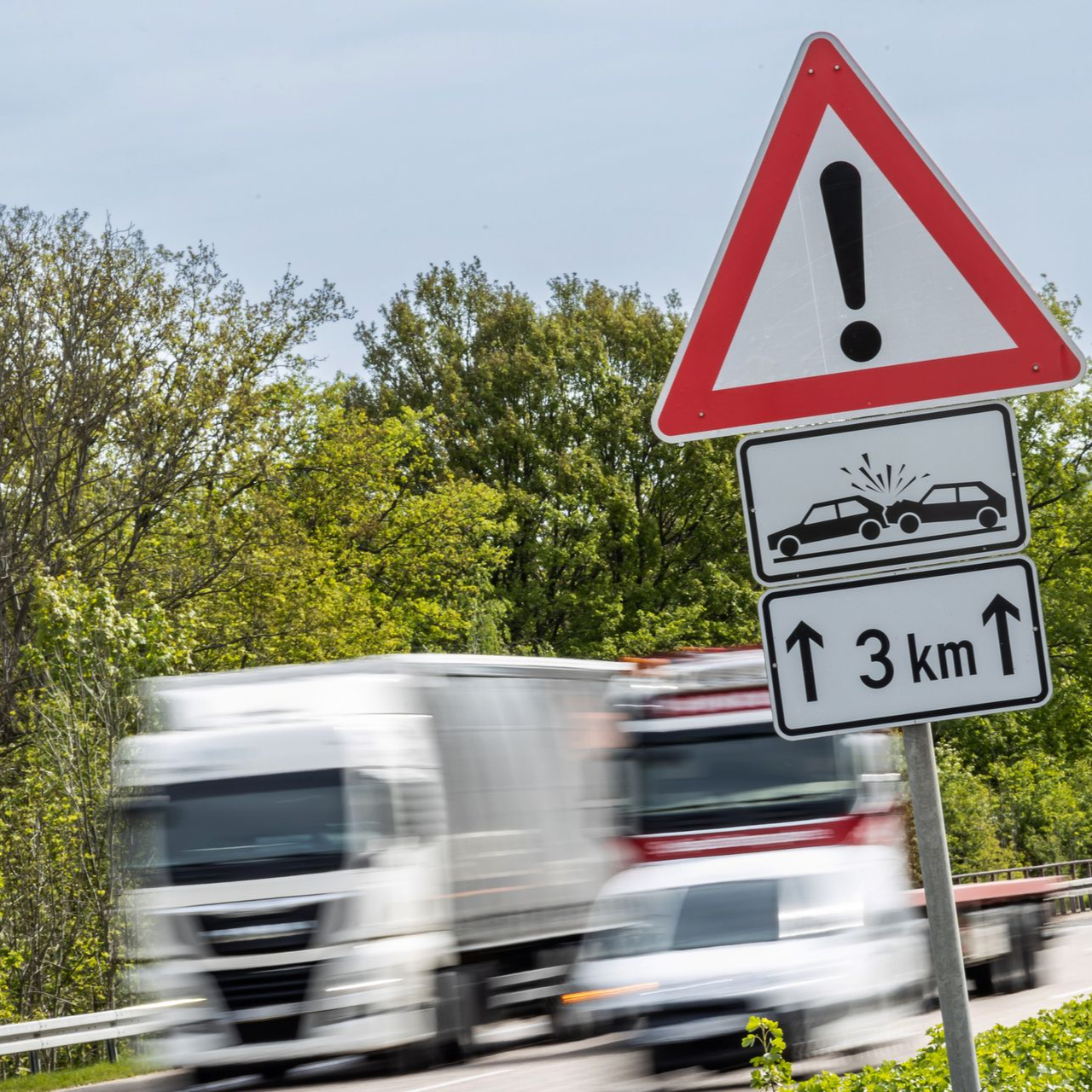Truck tipped over on its side.