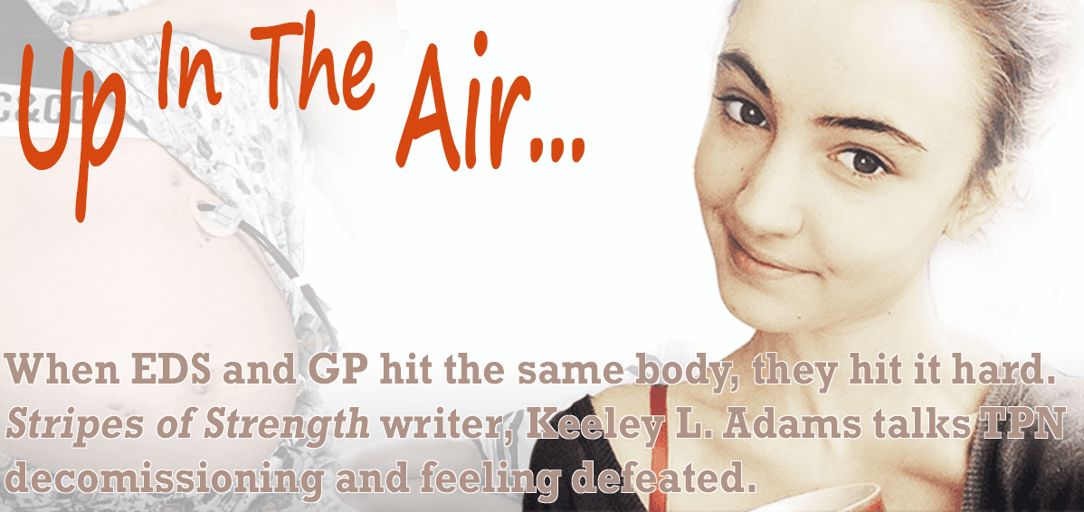 A young woman, a digestive tube and the words 'Up In The Air'.