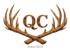 Logo with the letters "QC" in a textured brown font, framed by crossed deer antlers, with the text "Since 2012" below.