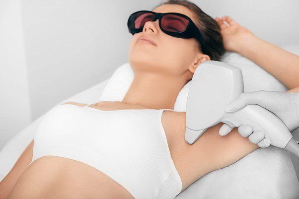 Lady On Laser Hair Removal Treatment — Tustin, CA — O de Rose Med Spa