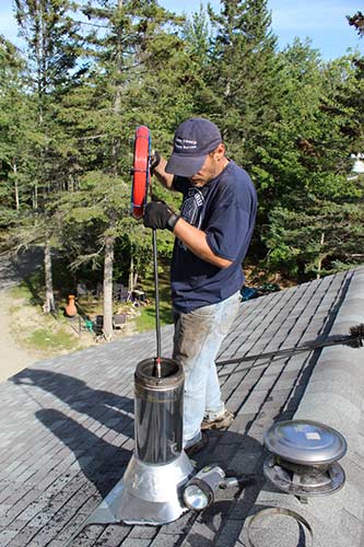 Stainless Steel Chimney Pipe Cleaning 2 —  Chimney System Installations in Hancock, ME