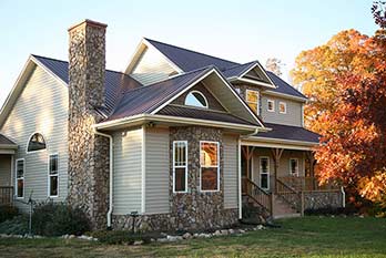 Beige and Stone House —  Chimney System Installations in Hancock, ME