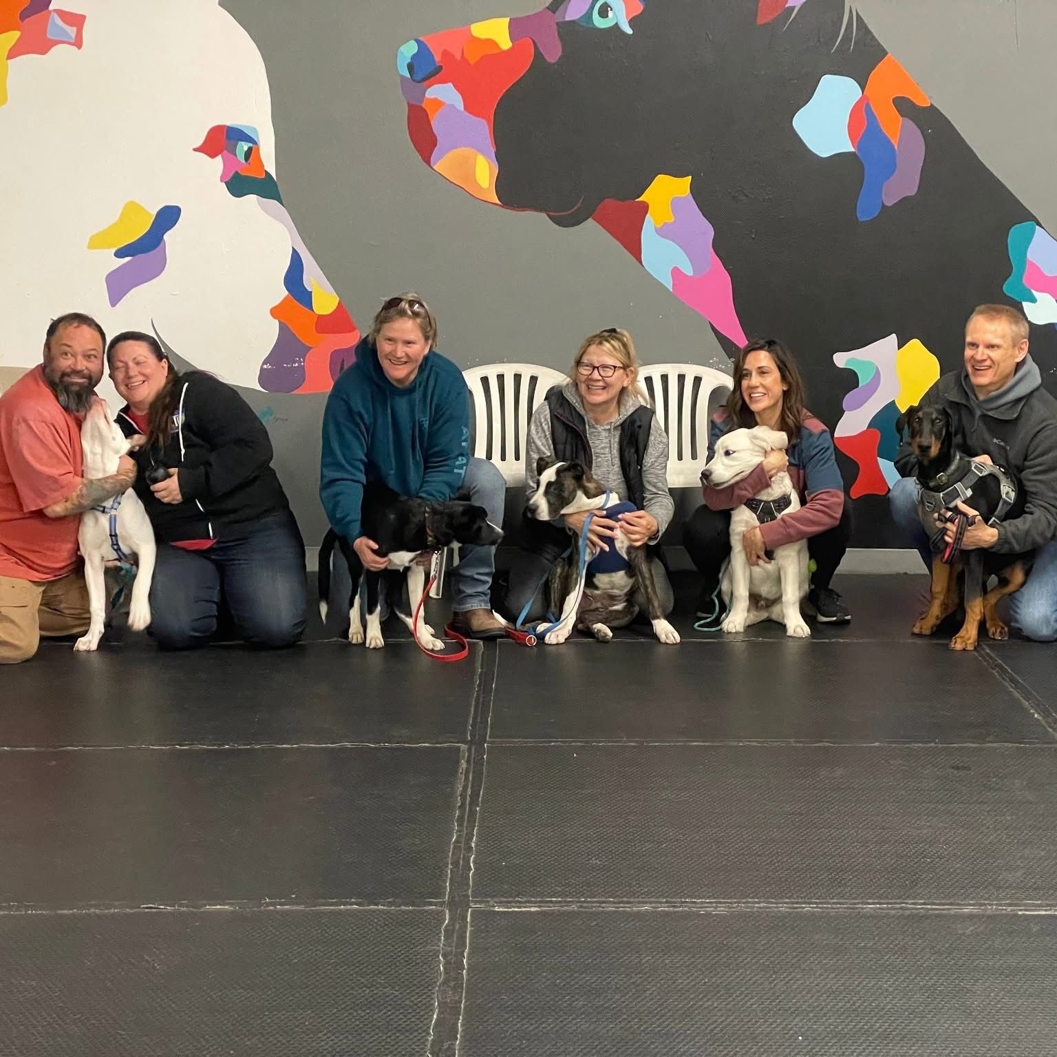 A happy class of puppy raising graduates.