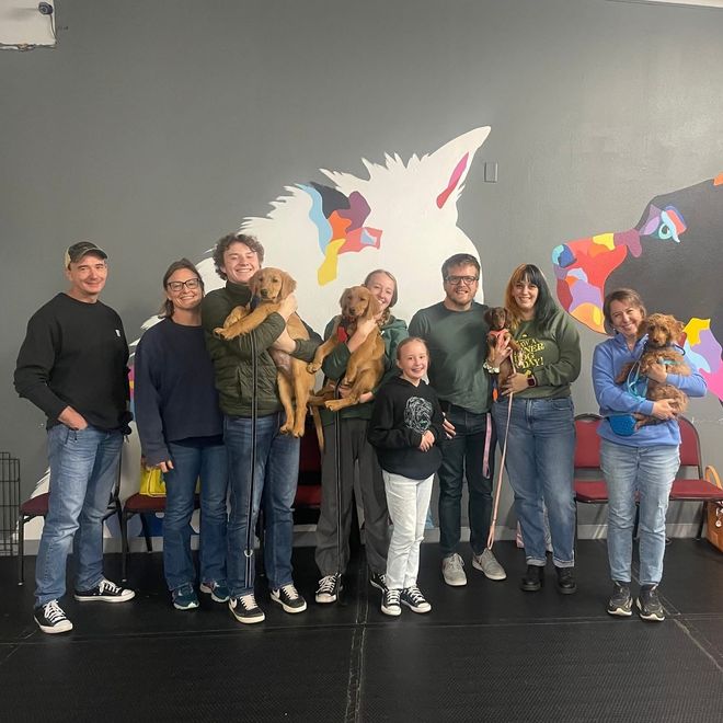 A slew of puppies and their owners.