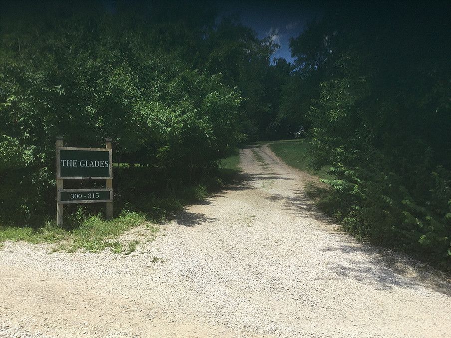 A wooden sign reading 