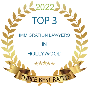 A gold laurel wreath with the words `` top 3 immigration lawyers in hollywood '' written on it.