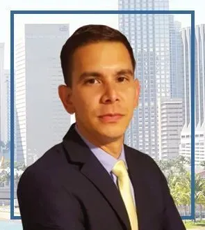 A man in a suit and tie is standing in front of a city skyline.