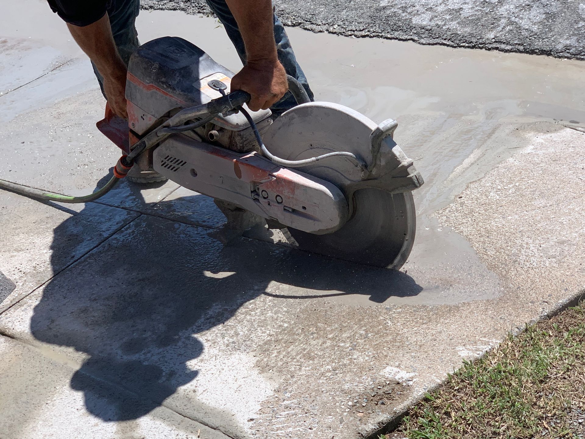Saw Cutting Concrete, Generating Dust; Construction Site — Ablecut Concrete Cutting & Coring In East Mackay, QLD