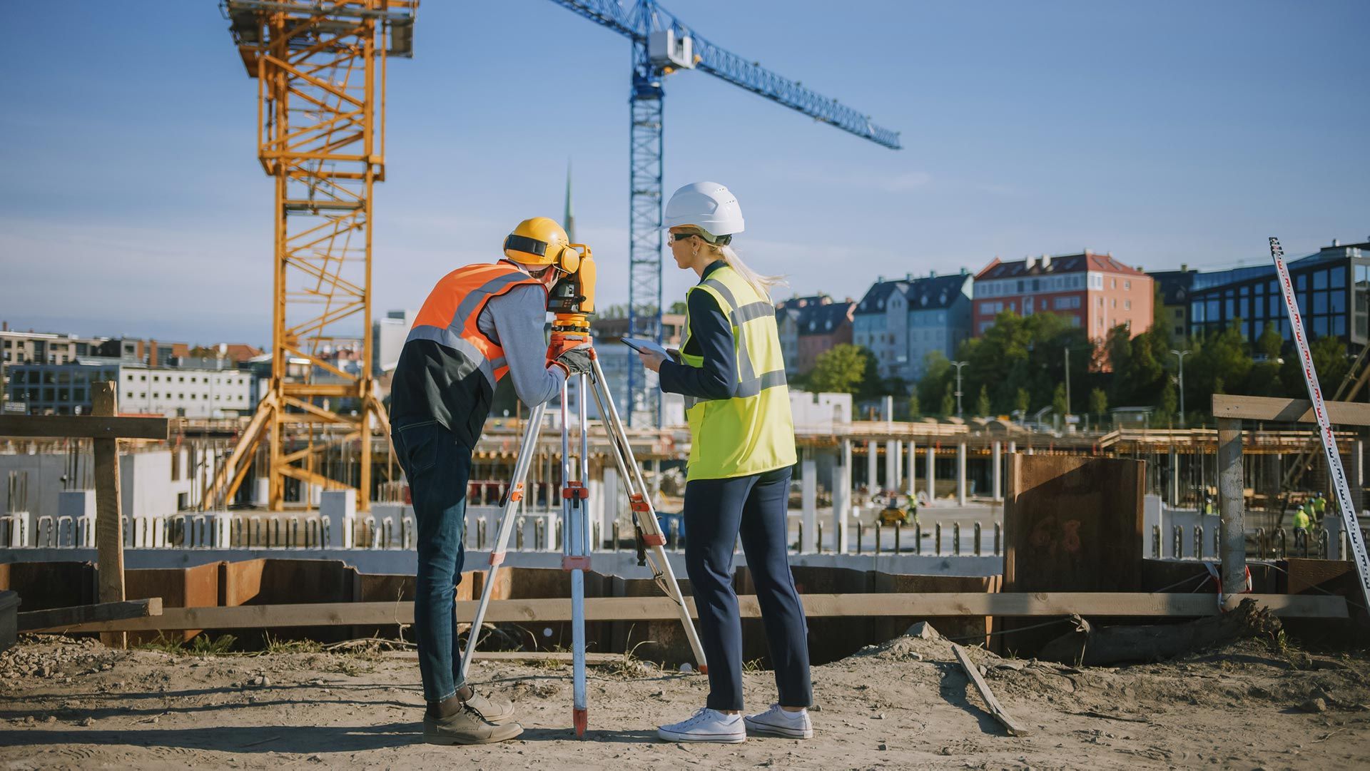 Worker using theodolite surveying optical instrument — Asheville, North Carolina — Alan B Styles Land Surveying, PLLC