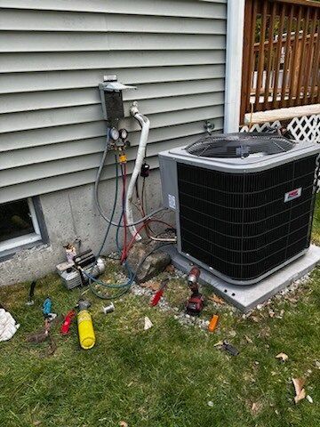 HVAC unit being serviced.