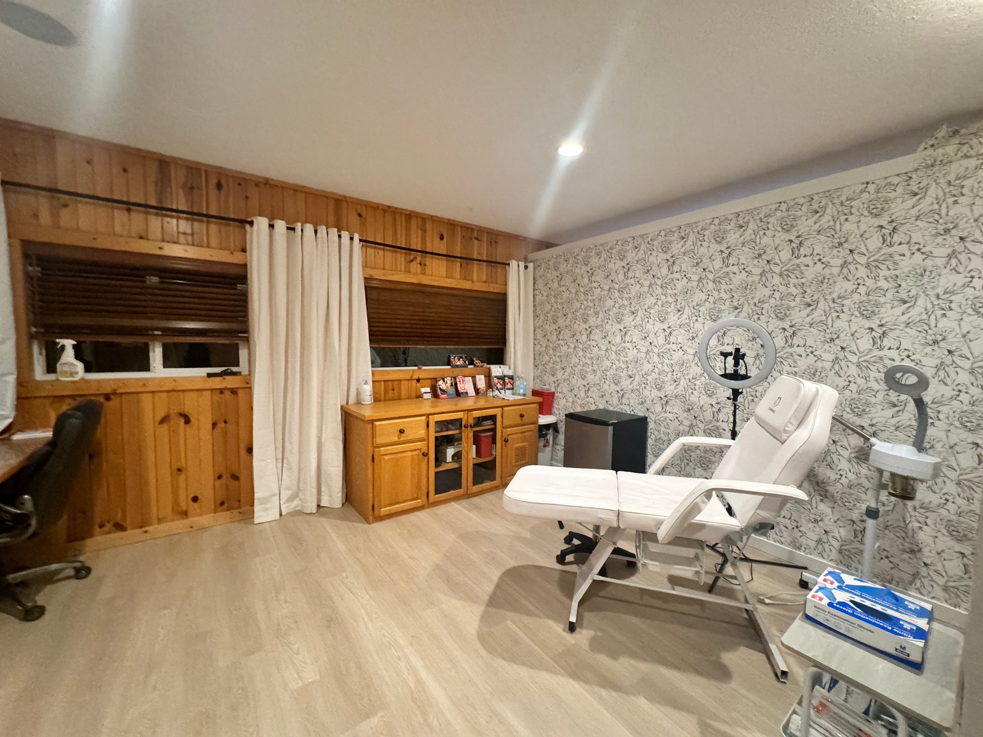 There is a chair in the middle of the room.