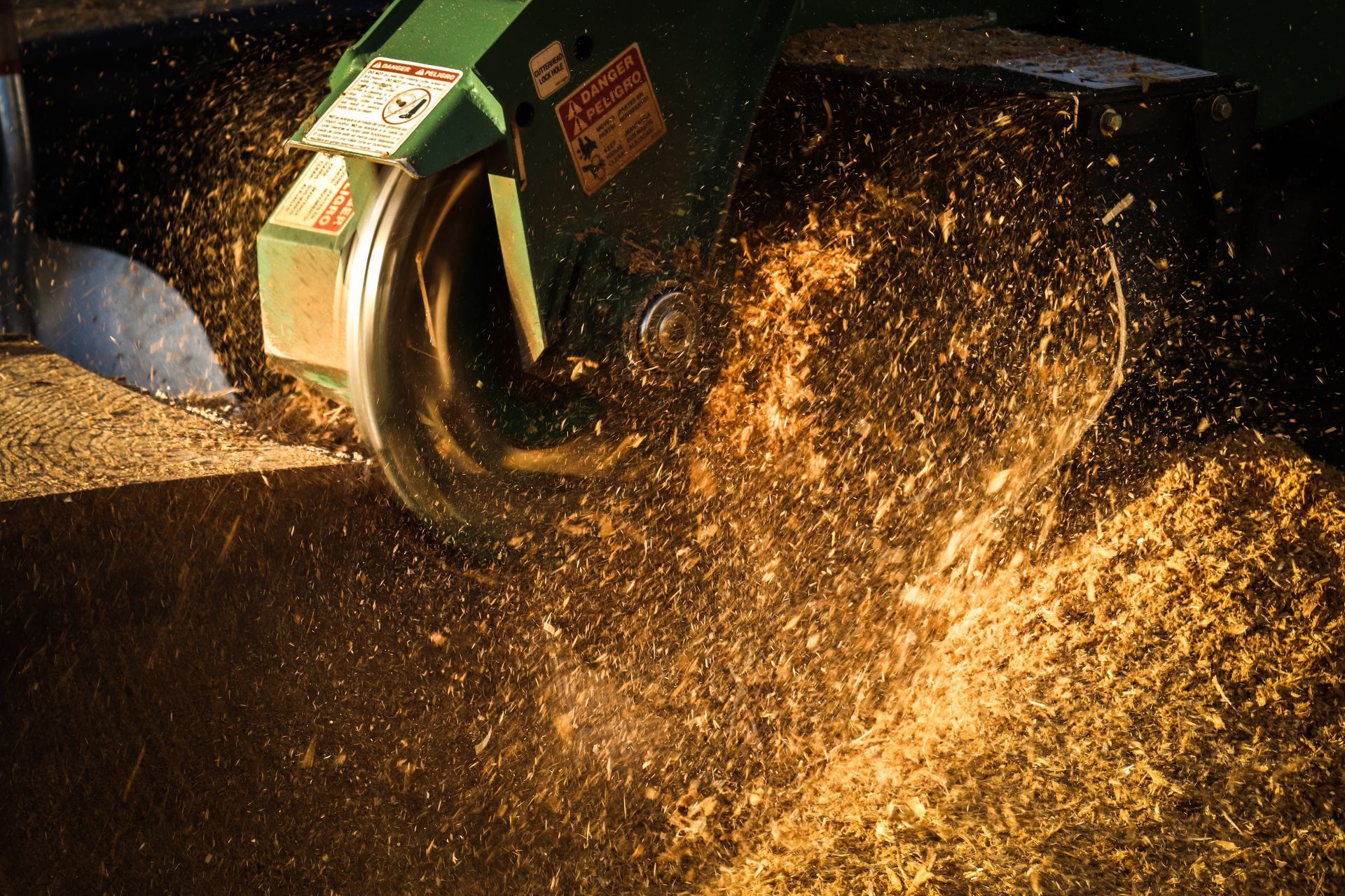 A circular saw is cutting a piece of wood