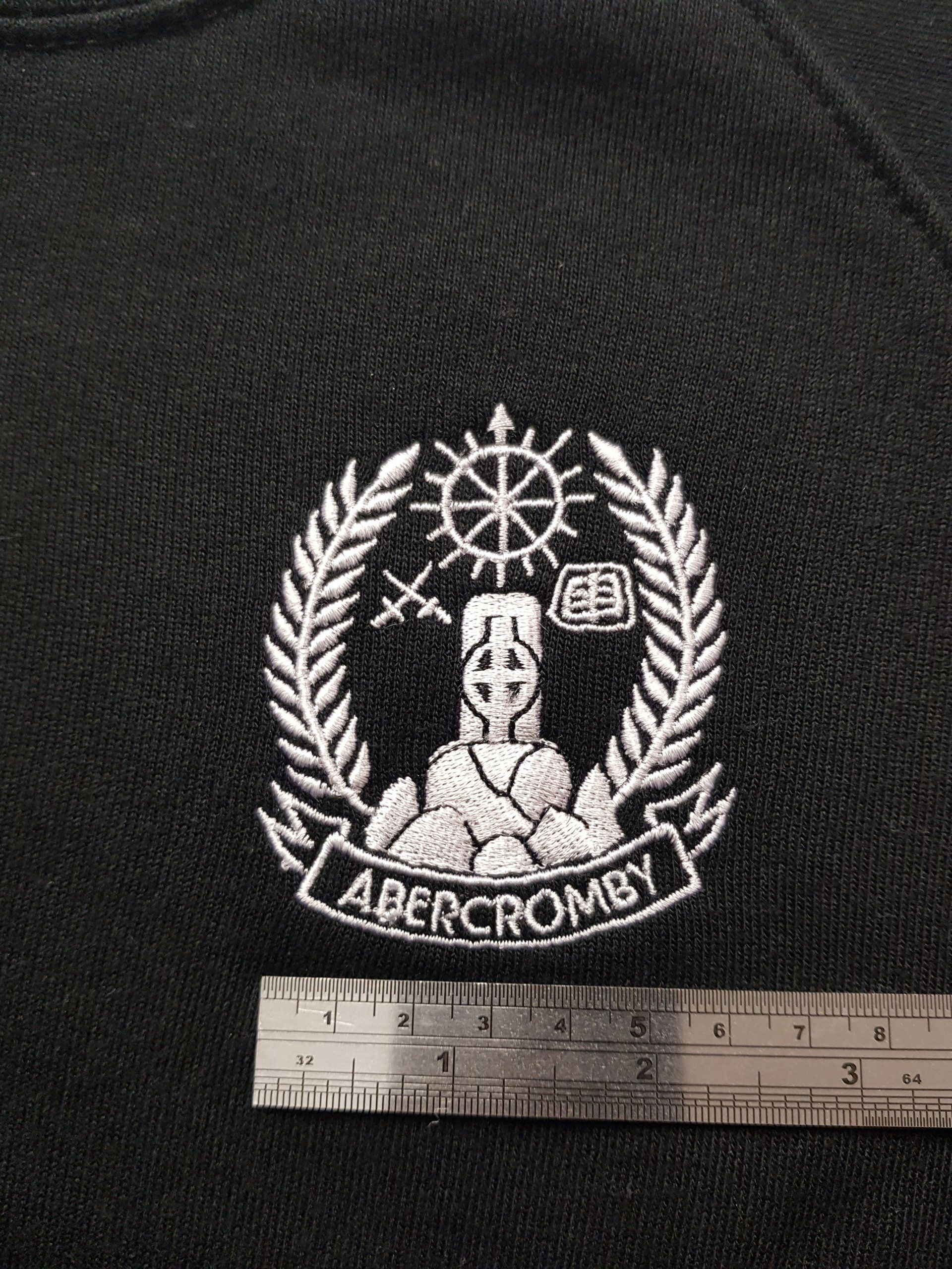 Intricate embroidery work, black t-shirt