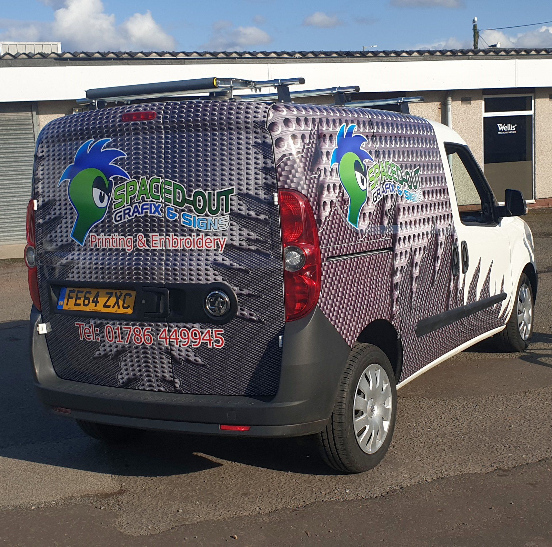 Business car from the back Spaced-Out Grafix & Design