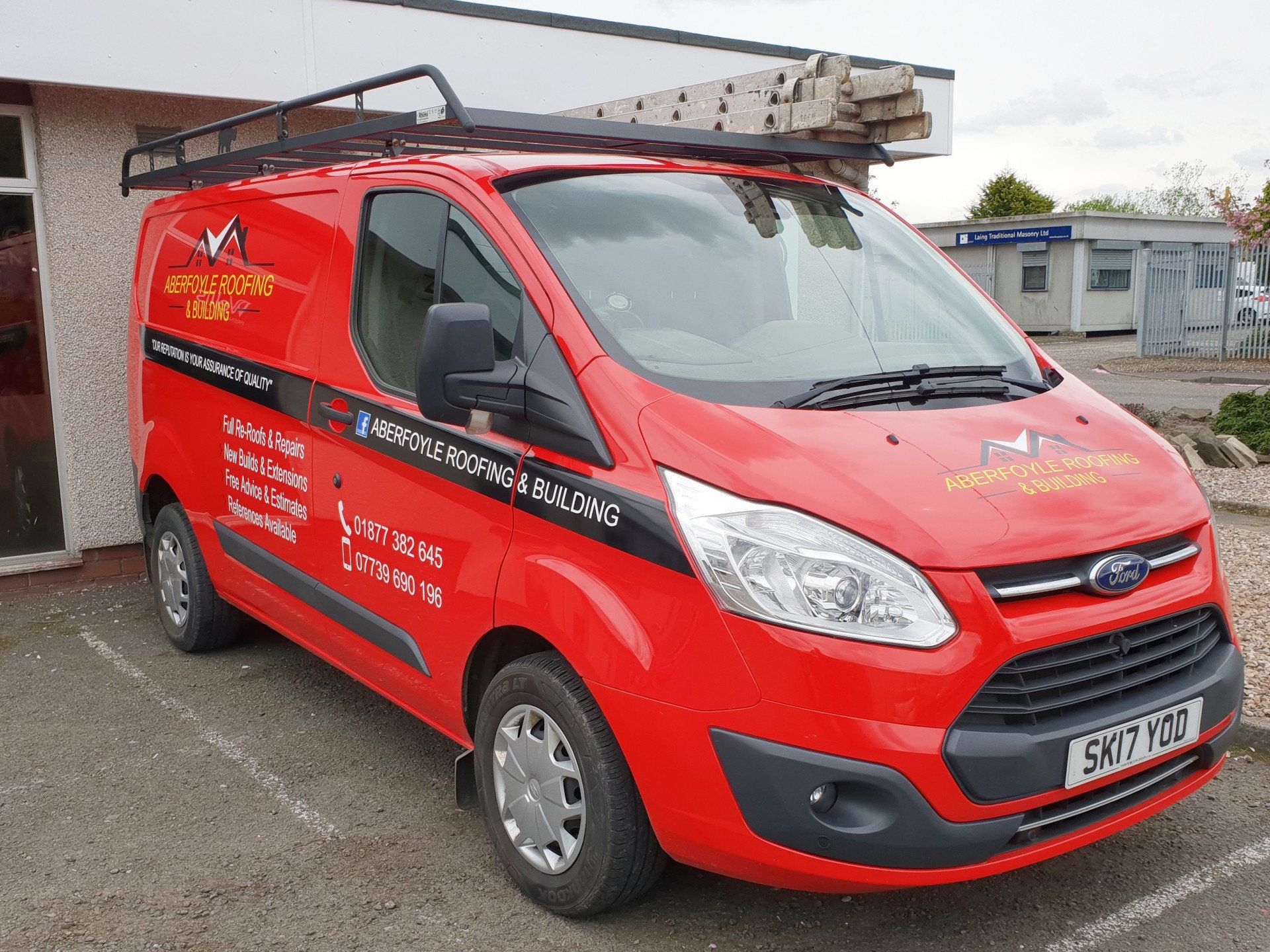 Car signs on a Ford Transit van in red, front view