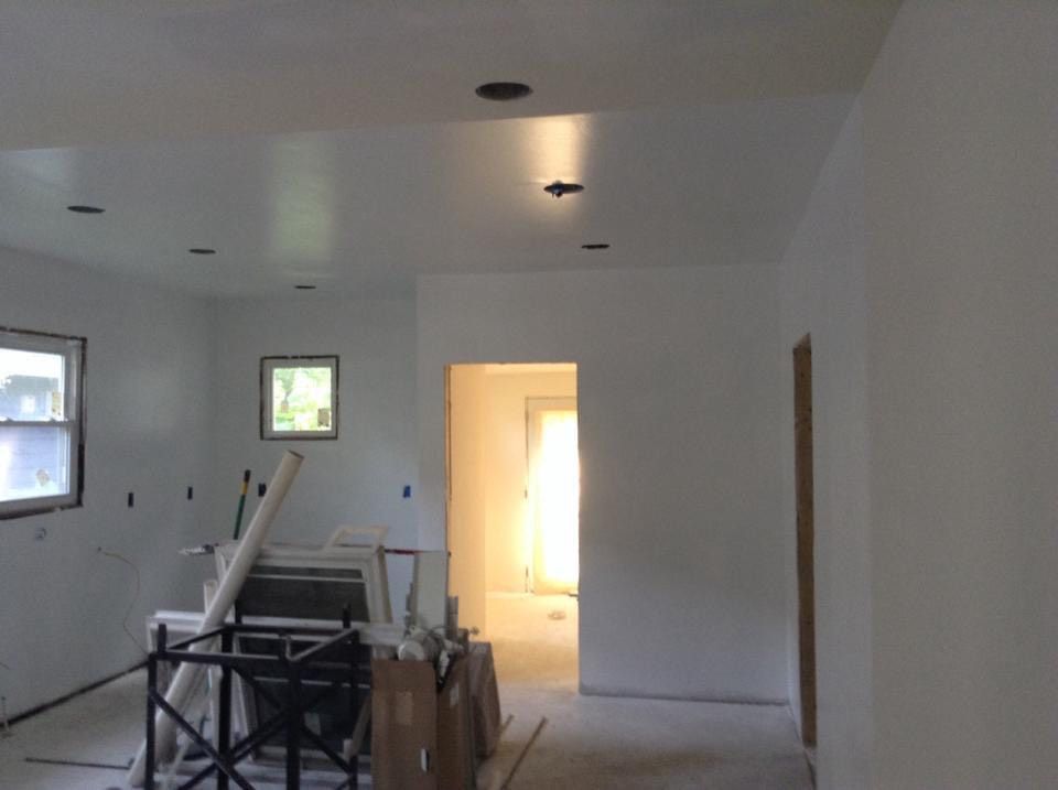 A room that is being remodeled with white walls