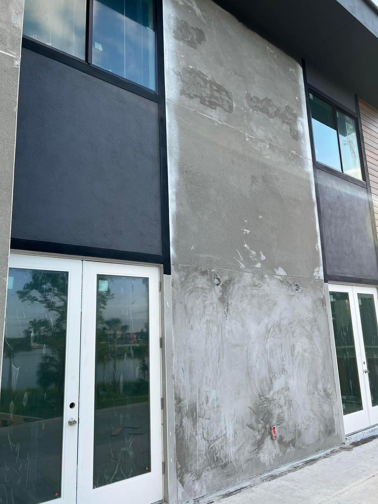 A building with a lot of windows and doors