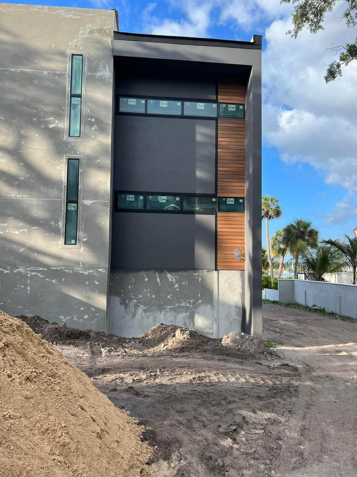 A large building with a lot of windows is being built