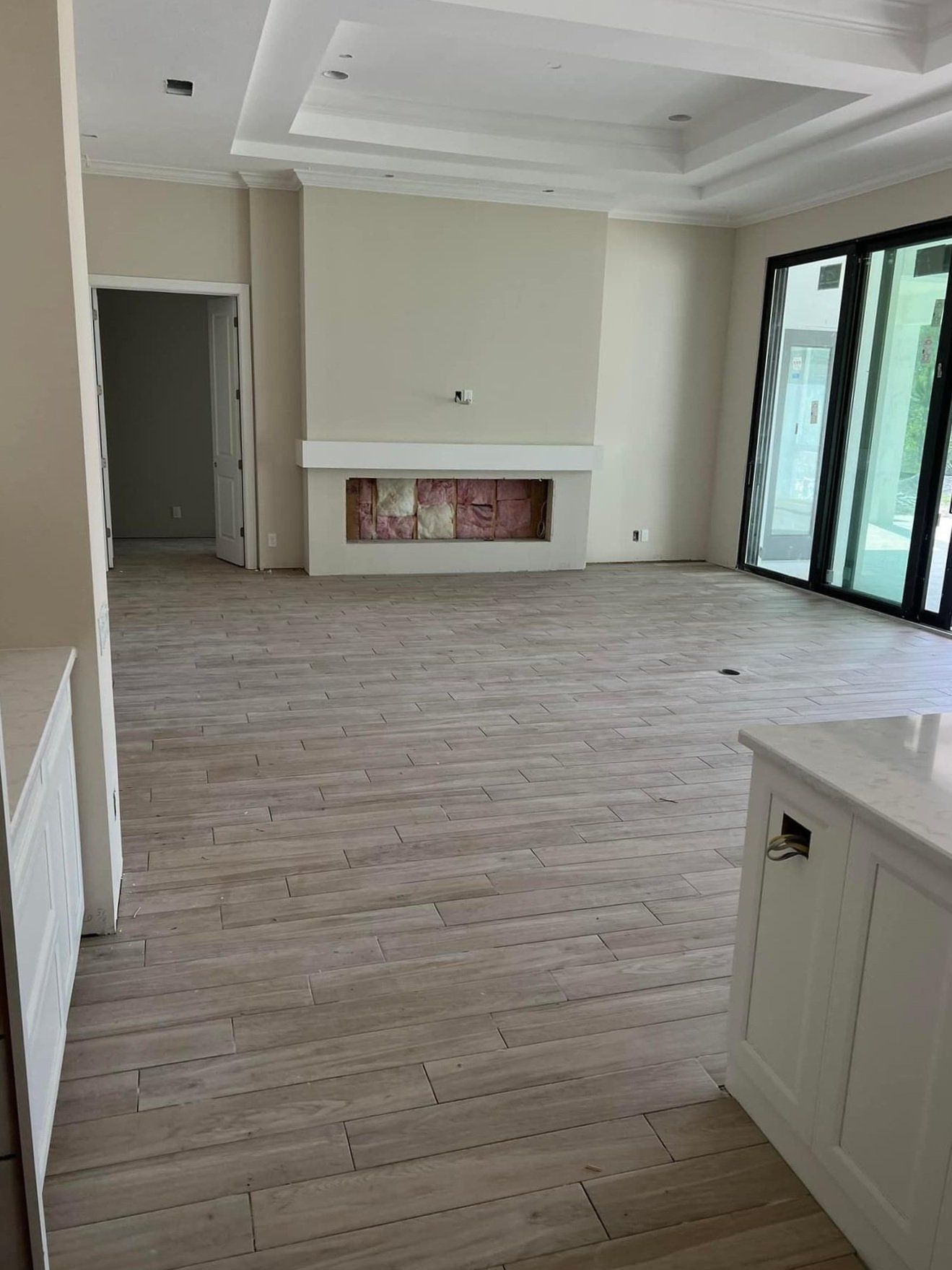 There is a fireplace in the middle of the room.