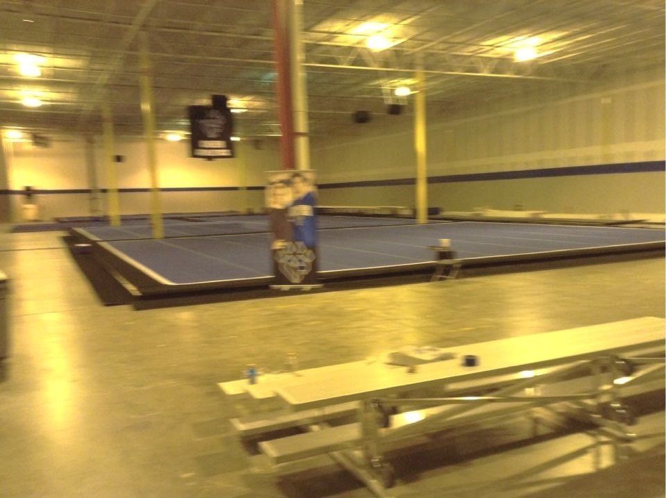 A basketball court with a sign that says ' basketball ' on it