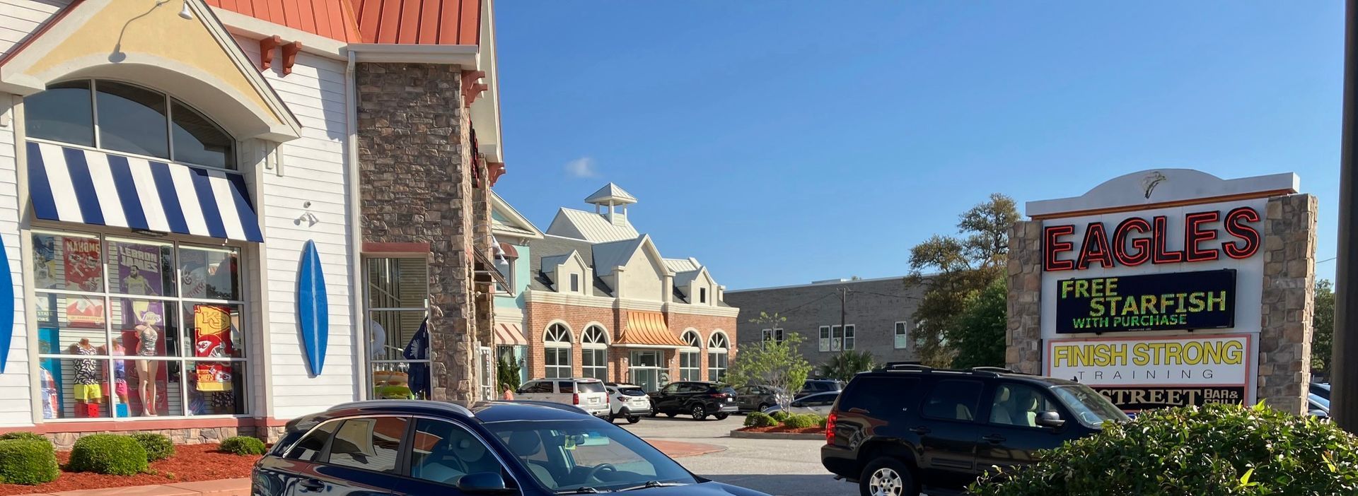 View of the shopping center from the south. Church entrance is hidden from view on the north (right) side.