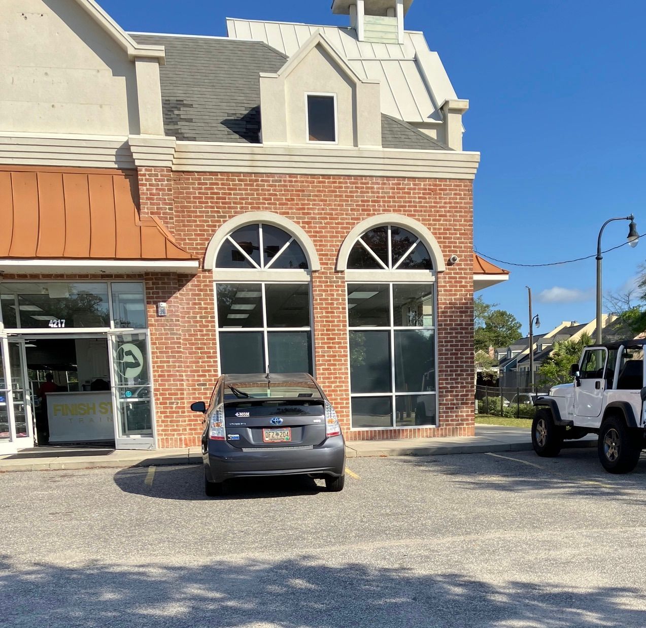 Walk to the north (right) side of the building to find the hidden entrance to the chapel and offices.