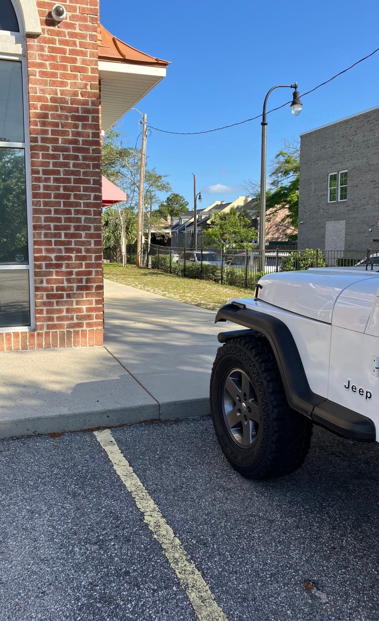 This is the sidewalk that leads to the church entrance on the north (right) side.