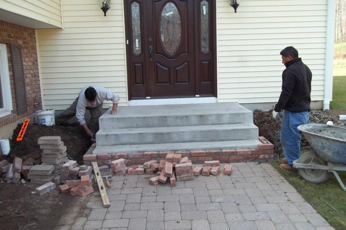 Workers Building New Stairs — New City, NY — KJS Hauling & Home Improvements, Inc.