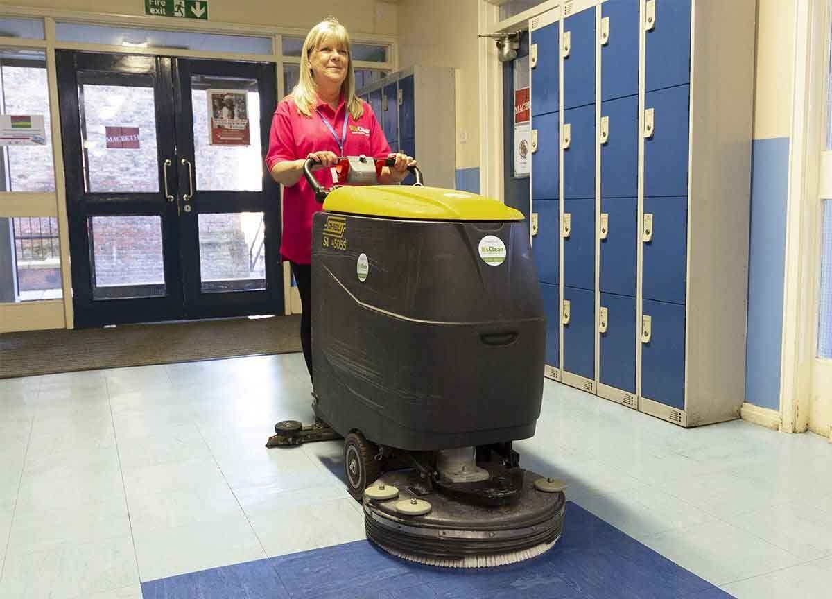 Cleaning Ripon Grammar School corridor with scrubber dryer