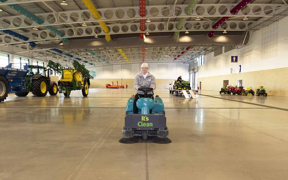 Cleaning Yorkshire Event Centre floor with ride on sweeper