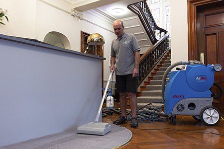 Agitation of pre-spray cleaning solution on office carpet