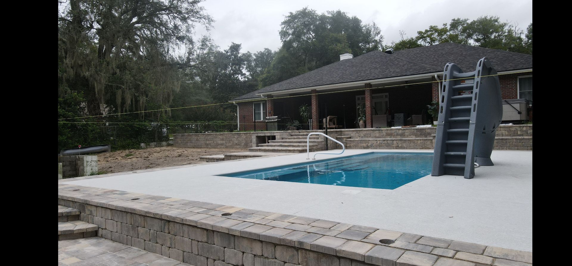 Jacksonville Project showing a paver pool deck design