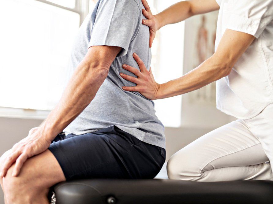 Rehabilitation Physiotherapy Worker With Senior Client — PhysioCare Townsville In Thuringowa Central, QLD