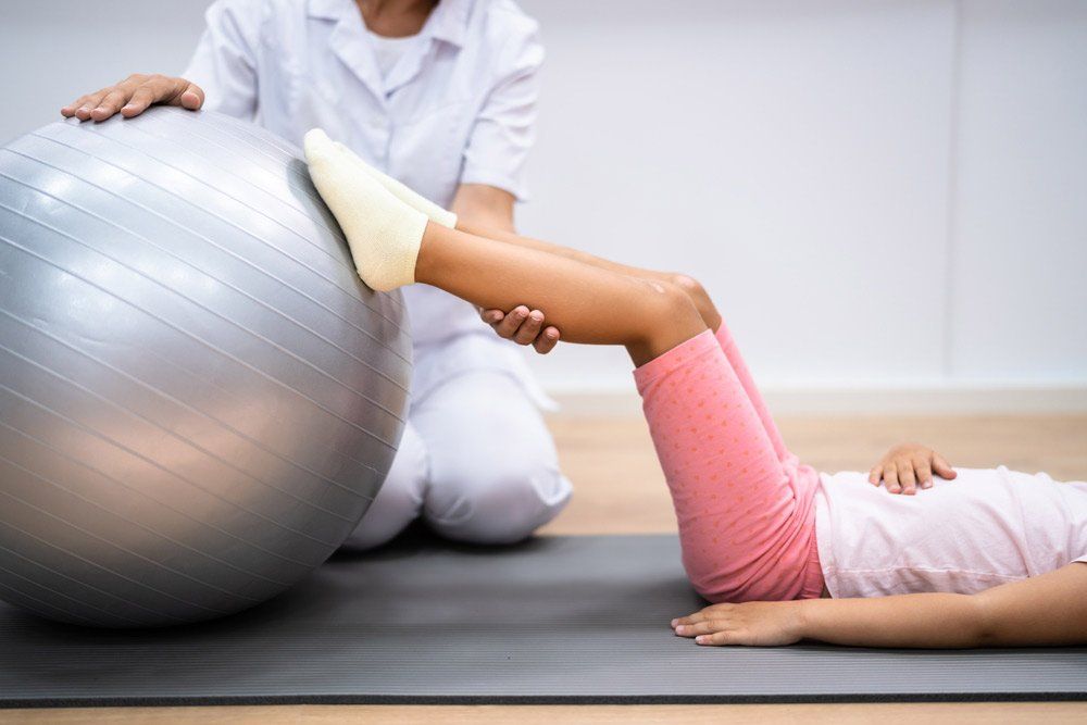 Balance Training Physiotherapy Exercise Treatment for Child — PhysioCare Townsville In Thuringowa Central, QLD