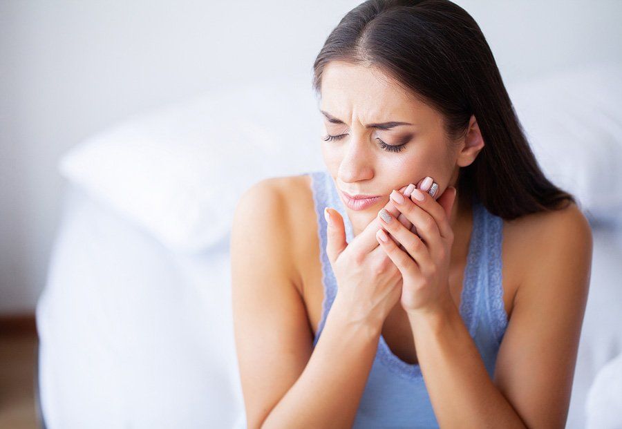 Woman Having a Toothache — Eastpointe, MI — Eastland & Professional Dental Center
