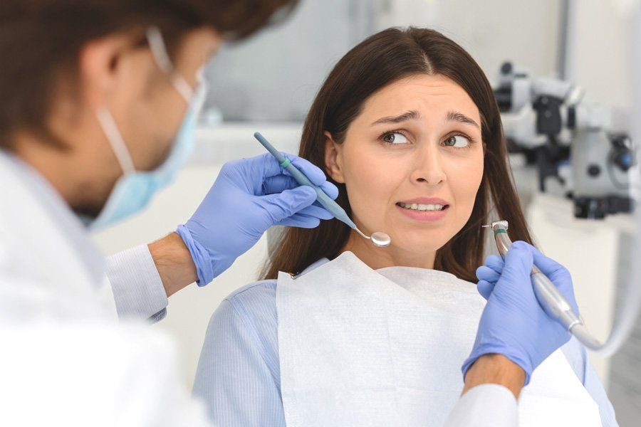 Woman Afraid of Dentist — Eastpointe, MI — Eastland & Professional Dental Center