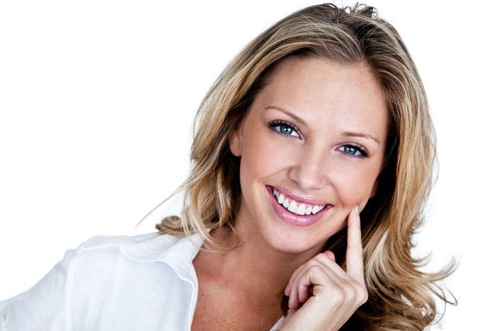 Woman Smiling — Eastpointe, MI — Universal Dental Center