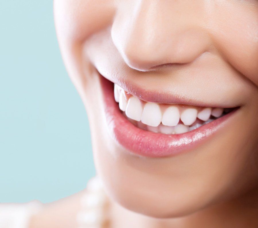 Woman Close-up View of White Teeth — Eastpointe, MI — Eastland & Professional Dental Center